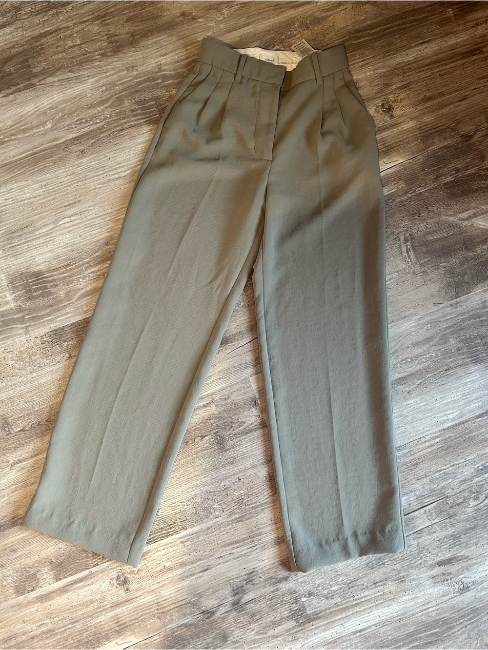 Wilfred High-Waist Pleated Trousers — soft green colour. 28” inseam length.
